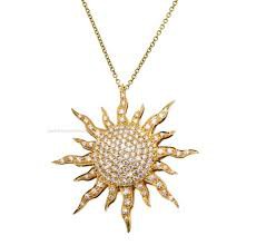 collana e orecchini a sole